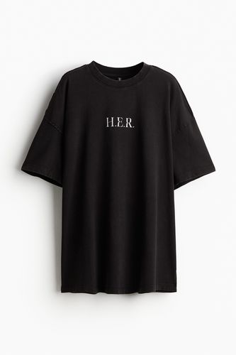 Oversized T-Shirt mit Print Schwarz/H.E.R. in Größe M. Farbe: - H&M - Modalova