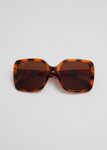 Sonnenbrille mit quadratischem Rahmen Braun/Orange gemustert, Sonnenbrillen in Größe Onesize. Farbe: - & Other Stories - Modalova