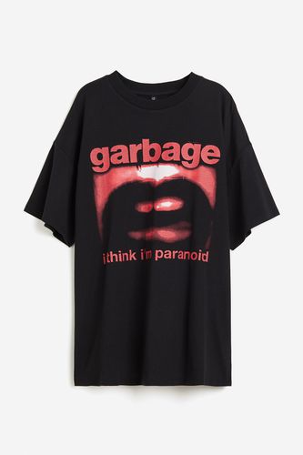 Oversized T-Shirt mit Print Schwarz/Garbage in Größe XXS. Farbe: - H&M - Modalova