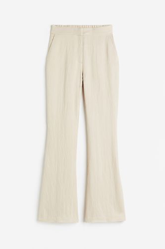 Ausgestellte Hose aus Viskose Hellbeige, Anzughosen in Größe 44. Farbe: - H&M - Modalova