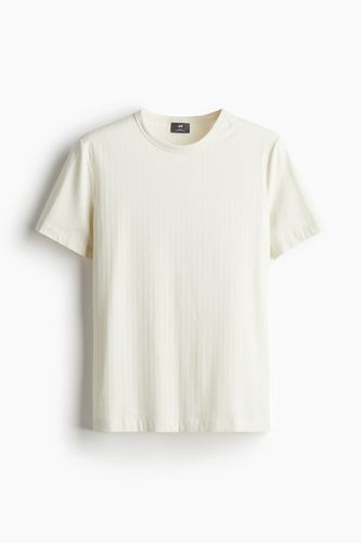 Geripptes T-Shirt aus Lyocell-Mix in Slim Fit Cremefarben Größe XS. Farbe: - H&M - Modalova