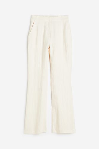 Ausgestellte Hose aus Viskose Cremefarben, Anzughosen in Größe 44. Farbe: - H&M - Modalova