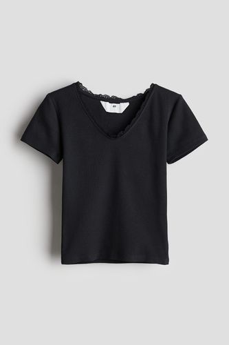 Baumwollshirt mit Spitzenbesatz Schwarz, T-Shirts & Tops in Größe 134/140. Farbe: - H&M - Modalova