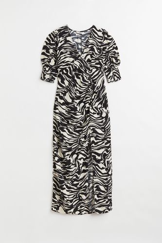 Crêpe-Kleid mit Puffärmeln Schwarz/Zebramuster, Alltagskleider in Größe S. Farbe: - H&M - Modalova