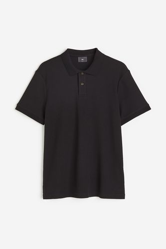 Poloshirt mit Waffelmuster in Slim Fit Schwarz, Poloshirts Größe XXL. Farbe: - H&M - Modalova