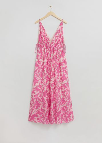 Kleid mit V-Ausschnitt und Bindedetails Rosa/Weiß gemustert, Alltagskleider in Größe L. Farbe: - & Other Stories - Modalova