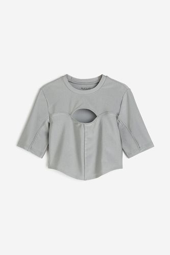 DryMove™ Kurzes Sportshirt mit Cut-out Silberfarben, Sport – T-Shirts in Größe M. Farbe: - H&M - Modalova