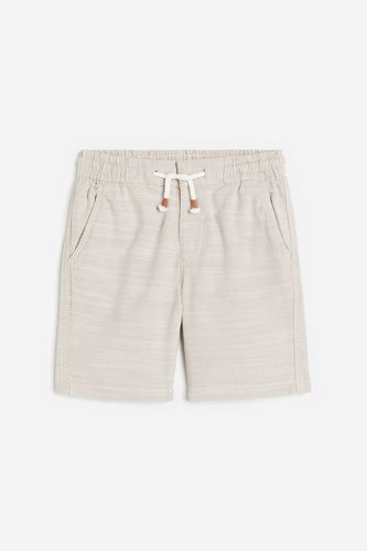 Chino-Shorts Loose Fit Hellbeige in Größe 122. Farbe: - H&M - Modalova