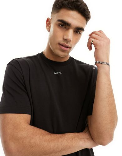 Nano - T-shirt nera con logo in tessuto interlock - Calvin Klein - Modalova