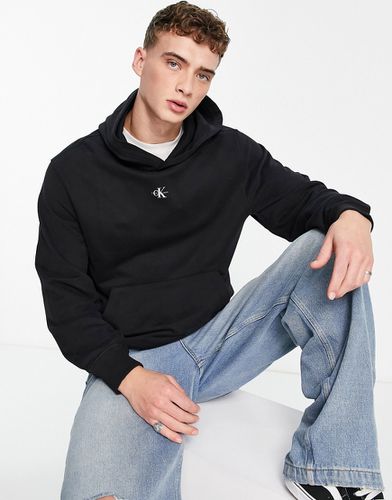 Felpa comoda nera con cappuccio e logo piccolo - Calvin Klein Jeans - Modalova