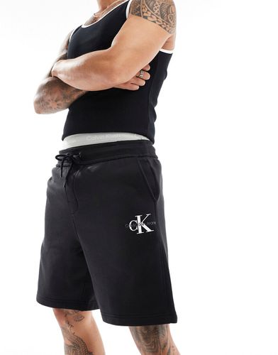 Pantaloncini neri con logo - Calvin Klein Jeans - Modalova