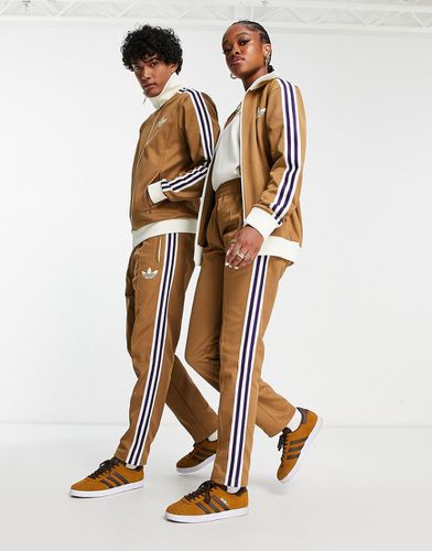 Adicolor 70s - Pantaloni della tuta unisex marroni con strisce - adidas Originals - Modalova