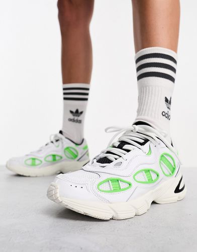 Astir - Sneakers bianche e verdi - adidas Originals - Modalova