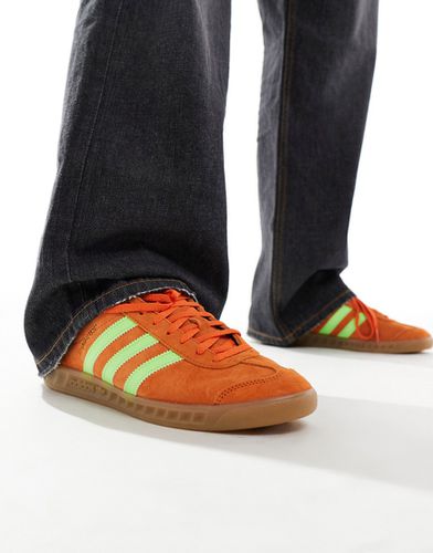 Hamburg - Sneakers arancioni e gialle - adidas Originals - Modalova