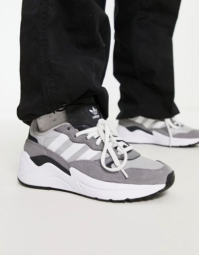 Retropy Adisuper - Sneakers grigie e bianche - adidas Originals - Modalova