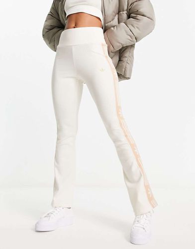 Ski Chic - Leggings color avena a zampa a coste - adidas Originals - Modalova