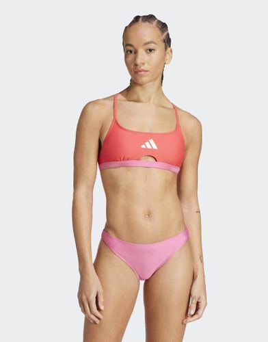 Bikini rembourré color lock à dos en X - Magenta pulse/Rouge semi lucid - Adidas Performance - Modalova