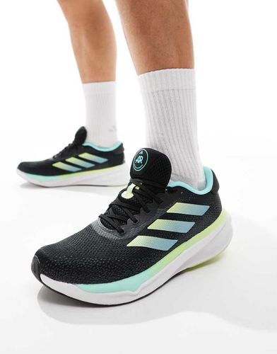 Adidas - Running Supernova Stride - Sneakers nere e blu acqua - adidas performance - Modalova