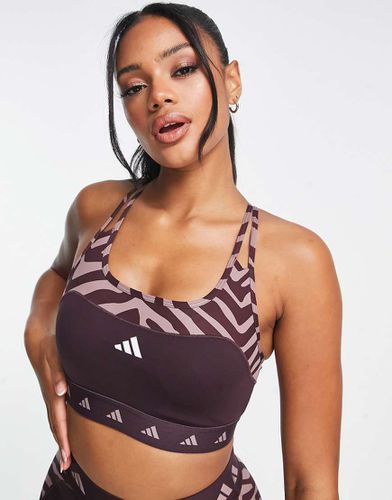 Adidas - Training Hyperglam - Reggiseno sportivo a supporto medio bordeaux con pannelli stampati zebrati - adidas performance - Modalova