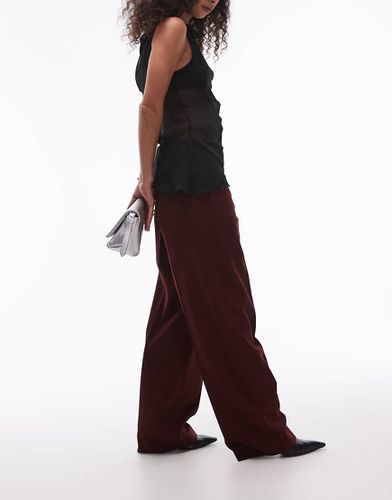 Pantaloni dritti elasticizzati in misto lana bordeaux con cuciture piatte - Arket - Modalova