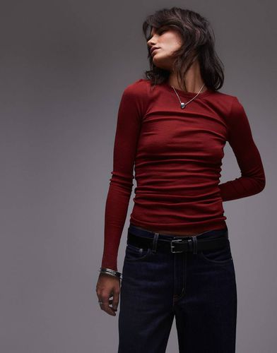 Top a maniche lunghe a coste in maglia di lana merino con scollo rotondo - Arket - Modalova