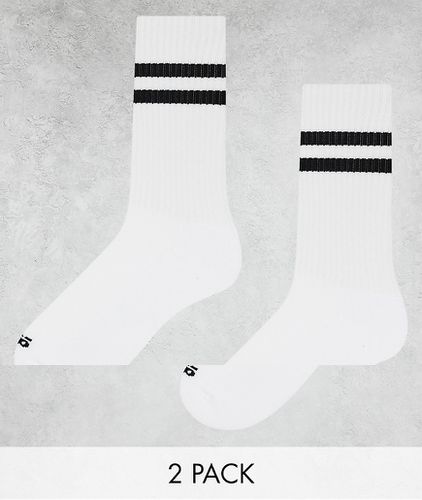 Confezione da 3 paia di calzini sportivi bianchi e neri antibatterici con 2 strisce - ASOS - Modalova