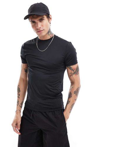 Icon - T-shirt attillata nera - ASOS - Modalova