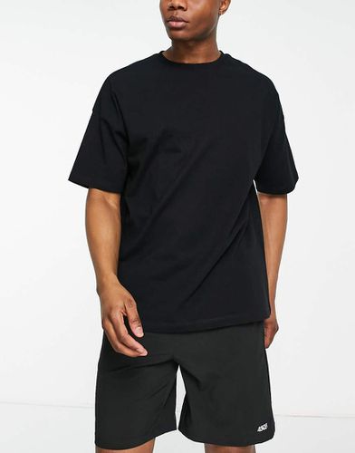 T-shirt per allenamento oversize nera - ASOS - Modalova