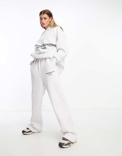 Joggers oversize mélange con logo - ASOS WEEKEND COLLECTIVE - Modalova