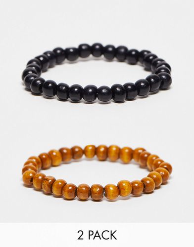 Confezione da 2 braccialetti nero e marrone con perline - ASOS DESIGN - Modalova