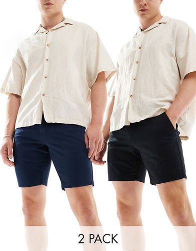 Confezione da 2 pantaloncini chino skinny taglio medio neri e blu navy - ASOS DESIGN - Modalova