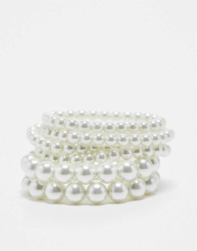 Confezione di 7 bracciali con perle sintetiche in vetro - ASOS DESIGN - Modalova