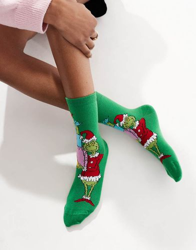 Calzini alla caviglia natalizi verdi con il Grinch - ASOS DESIGN - Modalova