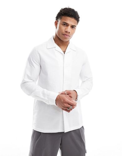 Camicia con rever ampio vestibilità classica in seersucker bianca - ASOS DESIGN - Modalova