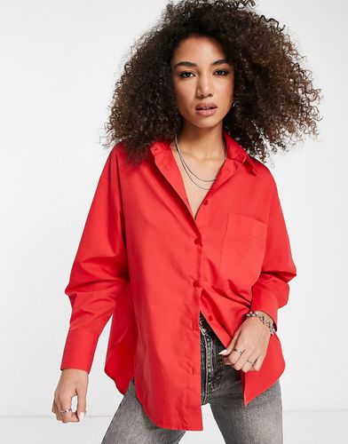 Camicia dad comoda rossa con taglio asimmetrico - ASOS DESIGN - Modalova