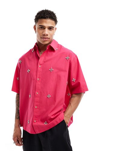 Camicia rosa con rever e decorazione - ASOS DESIGN - Modalova