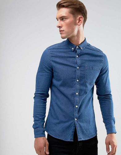 Camicia slim in denim elasticizzato lavaggio medio - ASOS DESIGN - Modalova