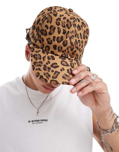 Cappellino morbido con stampa leopardata slavata - ASOS DESIGN - Modalova