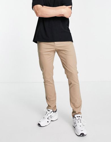 Chino skinny grigio pietra - ASOS DESIGN - Modalova