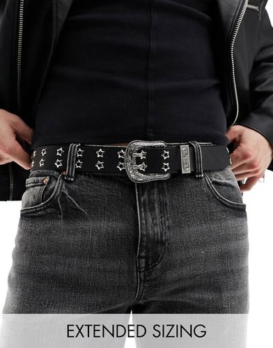 Cintura in pelle sintetica nera con fibbia argentata stile western e borchie a stella - ASOS DESIGN - Modalova