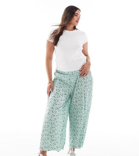 ASOS DESIGN Curve - Pantaloni culotte plissé ampi verde a fiorellini - ASOS Curve - Modalova