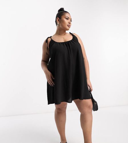 ASOS DESIGN Curve - Vestito corto a trapezio nero con spalline allacciate - ASOS Curve - Modalova