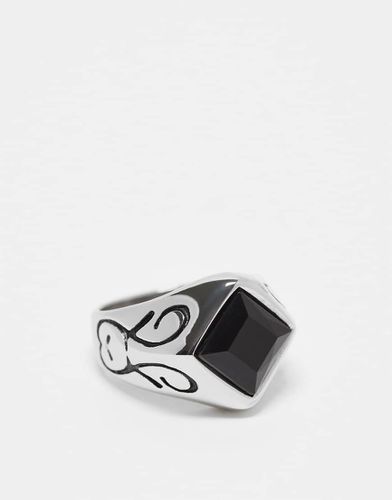 Anello con sigillo in acciaio inossidabile resistente all'acqua argentato con pietra geometrica nera - ASOS DESIGN - Modalova