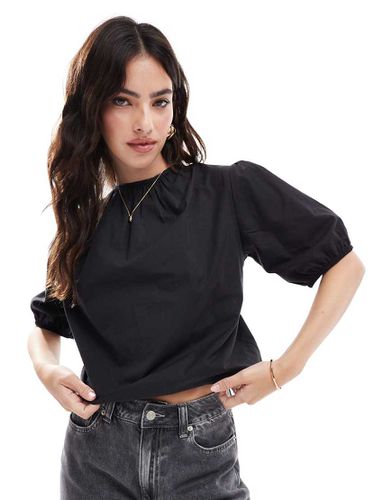 Blusa in popeline nera con maniche a sbuffo e dettaglio sul retro - ASOS DESIGN - Modalova