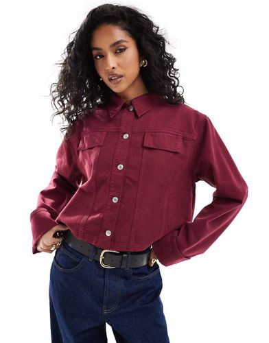 Giacca di jeans bordeaux con polsini risvoltati - ASOS DESIGN - Modalova