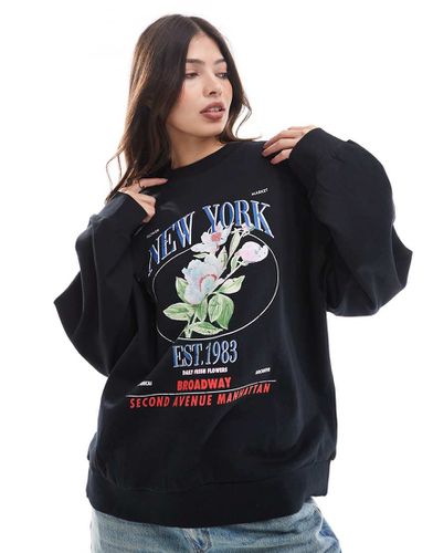 Felpa oversize nera con stampa "New York" e di fiori - ASOS DESIGN - Modalova