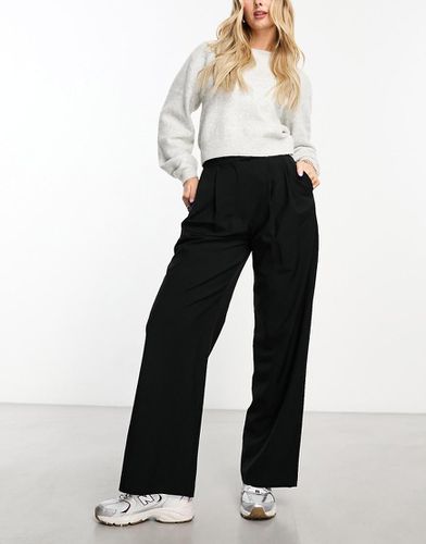 Hourglass - Pantaloni a fondo ampio sartoriali neri con pieghe - ASOS DESIGN - Modalova