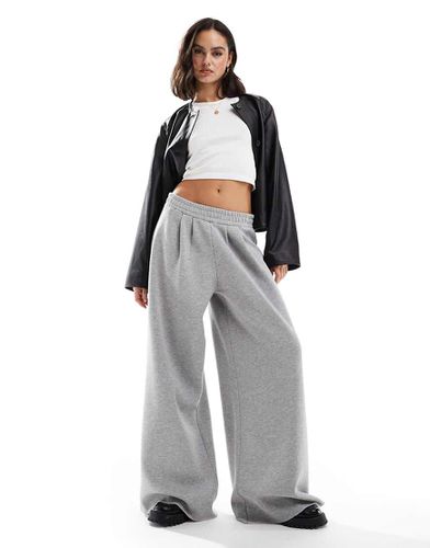 Joggers a fondo super ampio mélange - ASOS DESIGN - Modalova