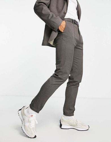 Joggers affusolati con fondo elasticizzato color antracite testurizzato - ASOS DESIGN - Modalova