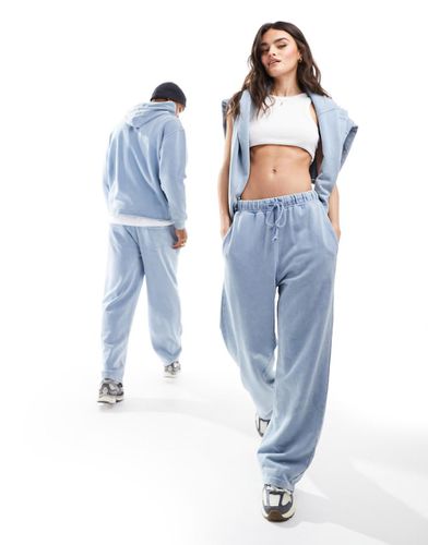 Joggers ampi unisex denim slavato in coordinato - ASOS DESIGN - Modalova